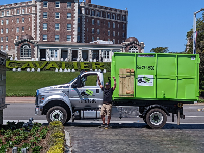 Dumpster Rental Truck by the Cavalier Hotel in VA